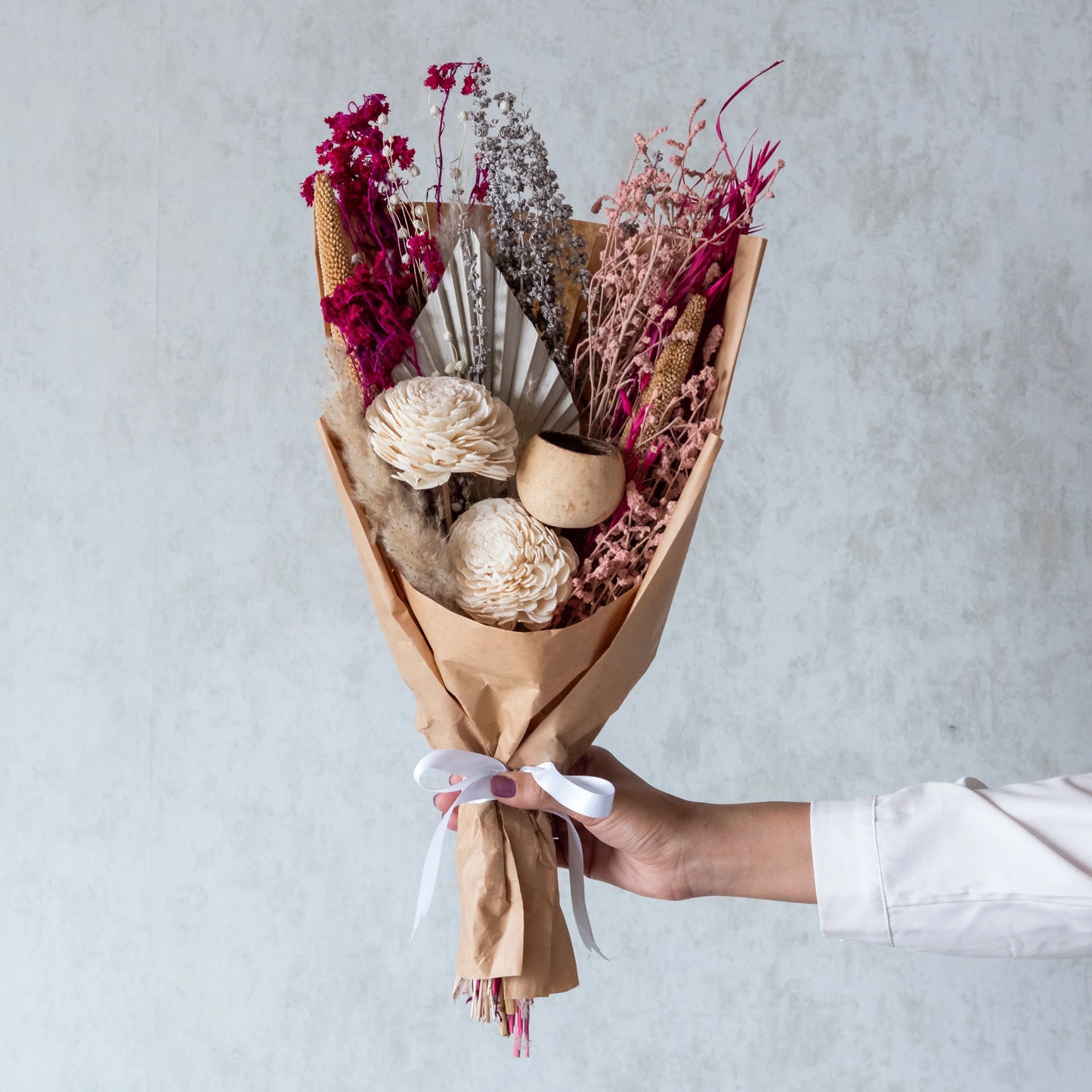 Blush Pink Bunch in a White U Shaped Vase
