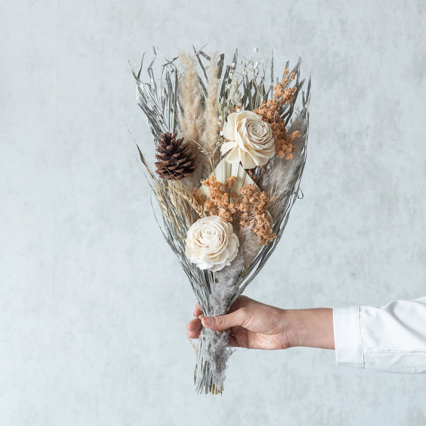 Silver Dawn Bunch in a White Ribbed Vase