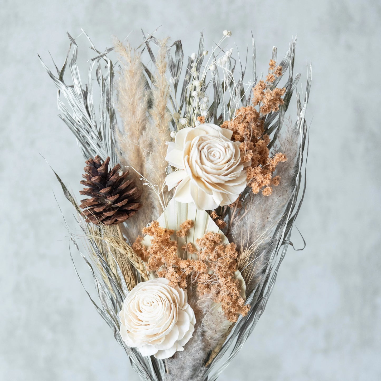 Silver Dawn Bunch in a White Ribbed Vase