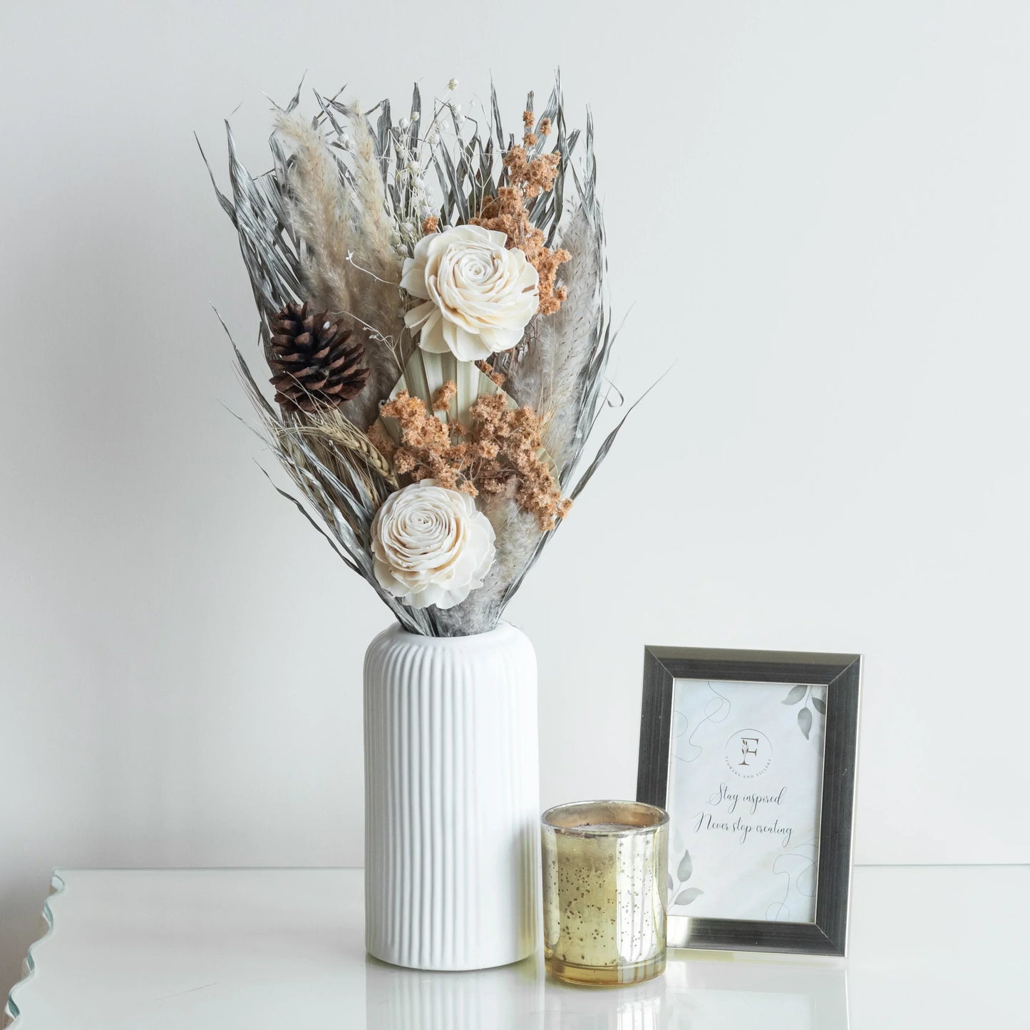 Silver Dawn Bunch in a White Ribbed Vase