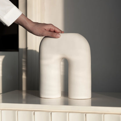 Glow pampas in a White U Shaped Vase