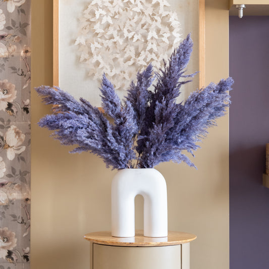 Lavender pampas in a White U Shaped Vase