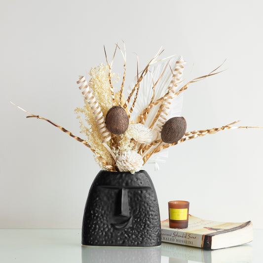 Sun-Kissed Bunch in a Quirky Face Vase