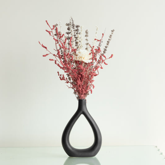 The Cute Little Bunch In the Black Swan Vase